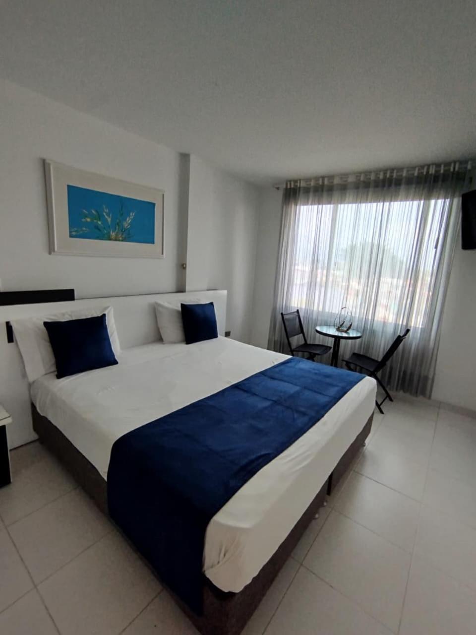 Hotel Bahia Villavicencio Quarto foto